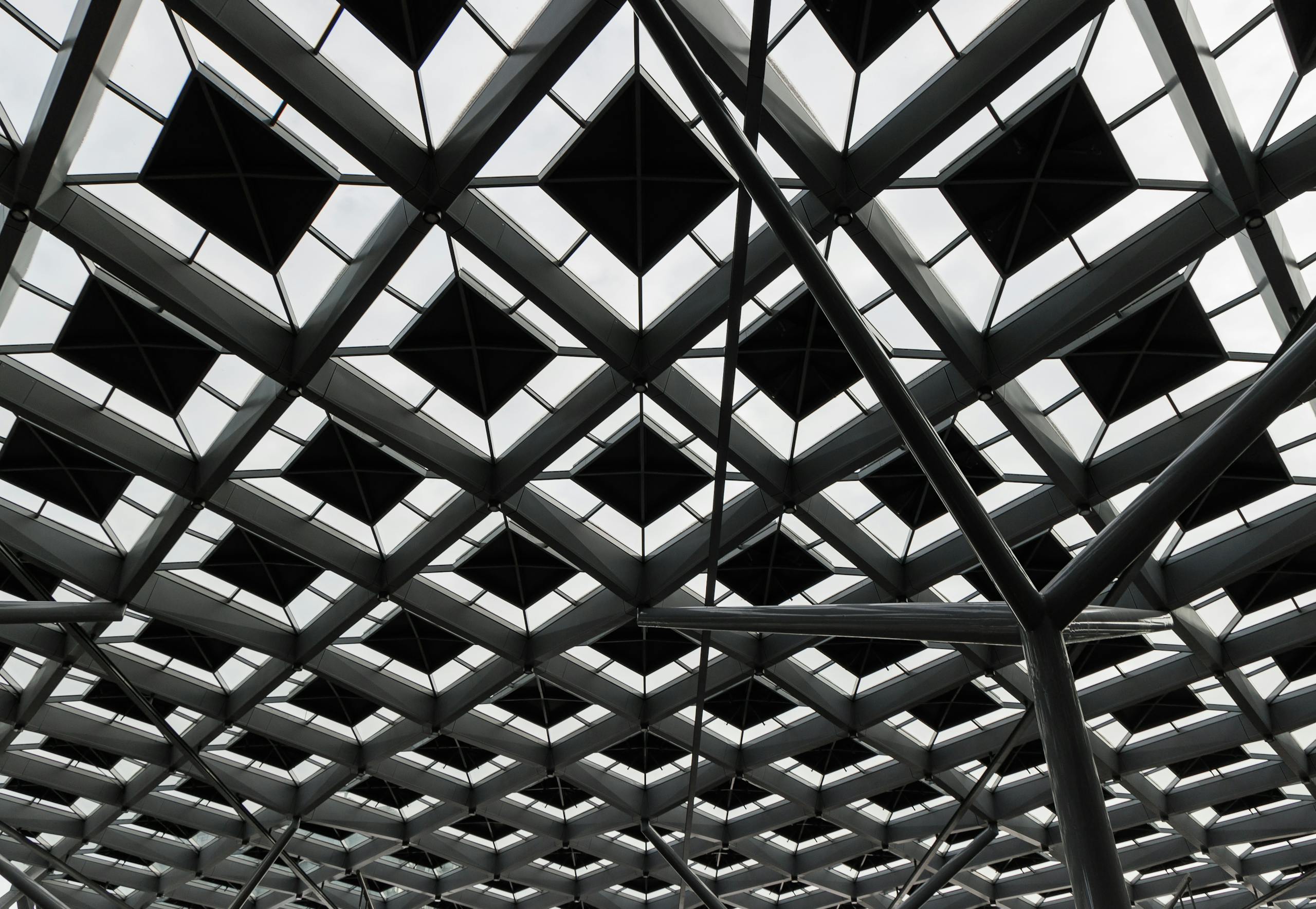 Intricate geometric patterns on the modern roof of The Hague Central Station in South Holland.